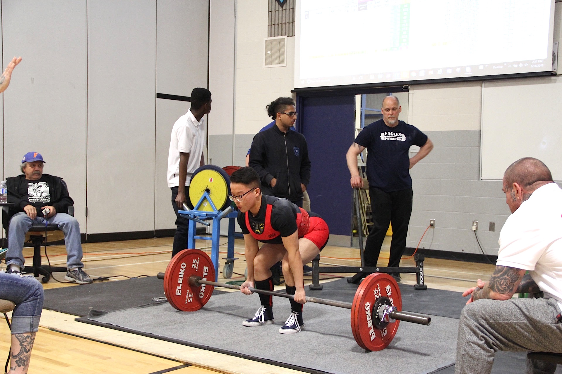 Milton High student beats world records in weightlifting